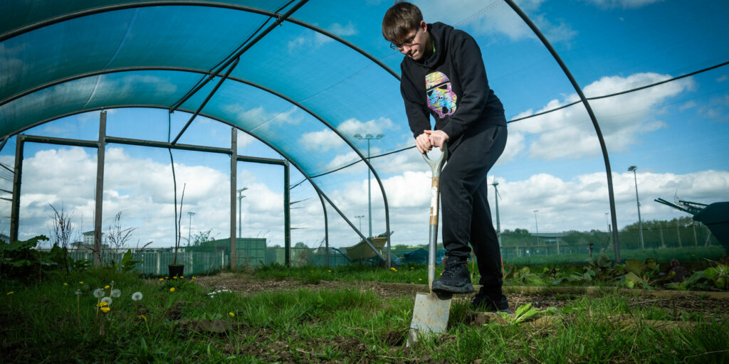 A land-based student digging at Dearne Valley College