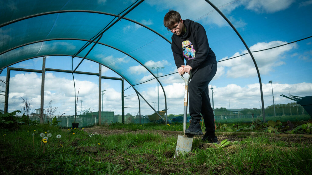 A land-based student digging at Dearne Valley College