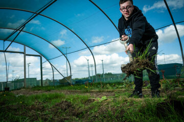 A land-based student digging