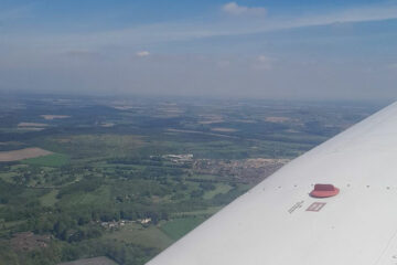 Student flying a light aircraft - view from the window