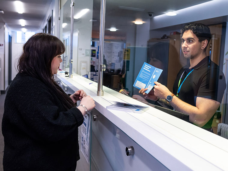 Two members of staff at College