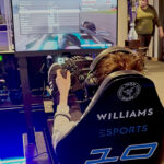 An esports student playing a game