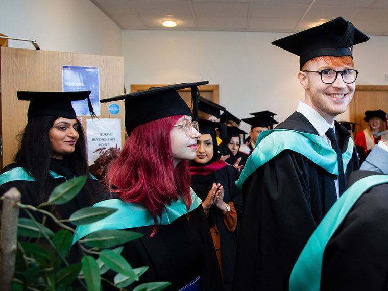 Students going in to the ceremony at graduation 2023