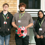 Students paying their respects at a war memorial