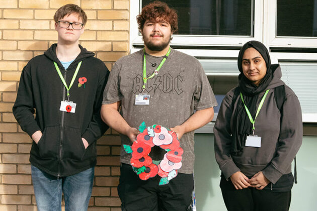 Students paying their respects at a war memorial