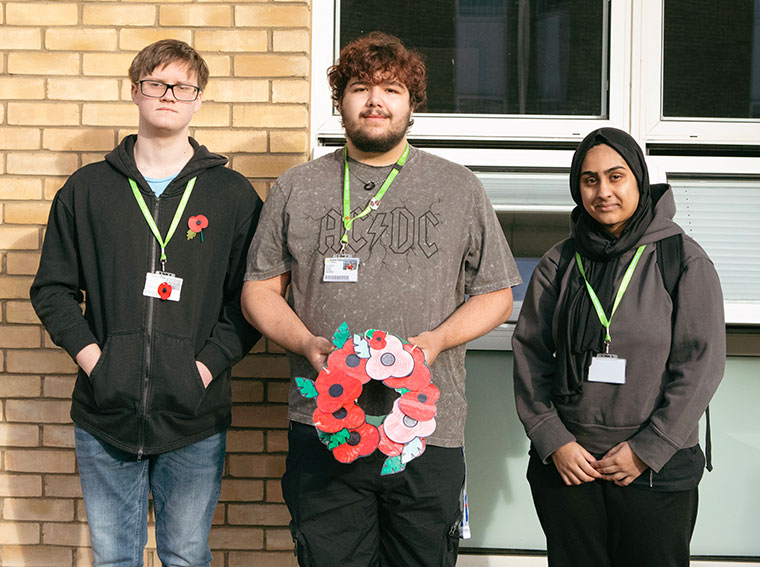 Students paying their respects at a war memorial