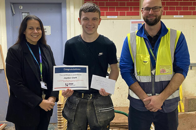 Construction students taking part in the brick pressure test competitions